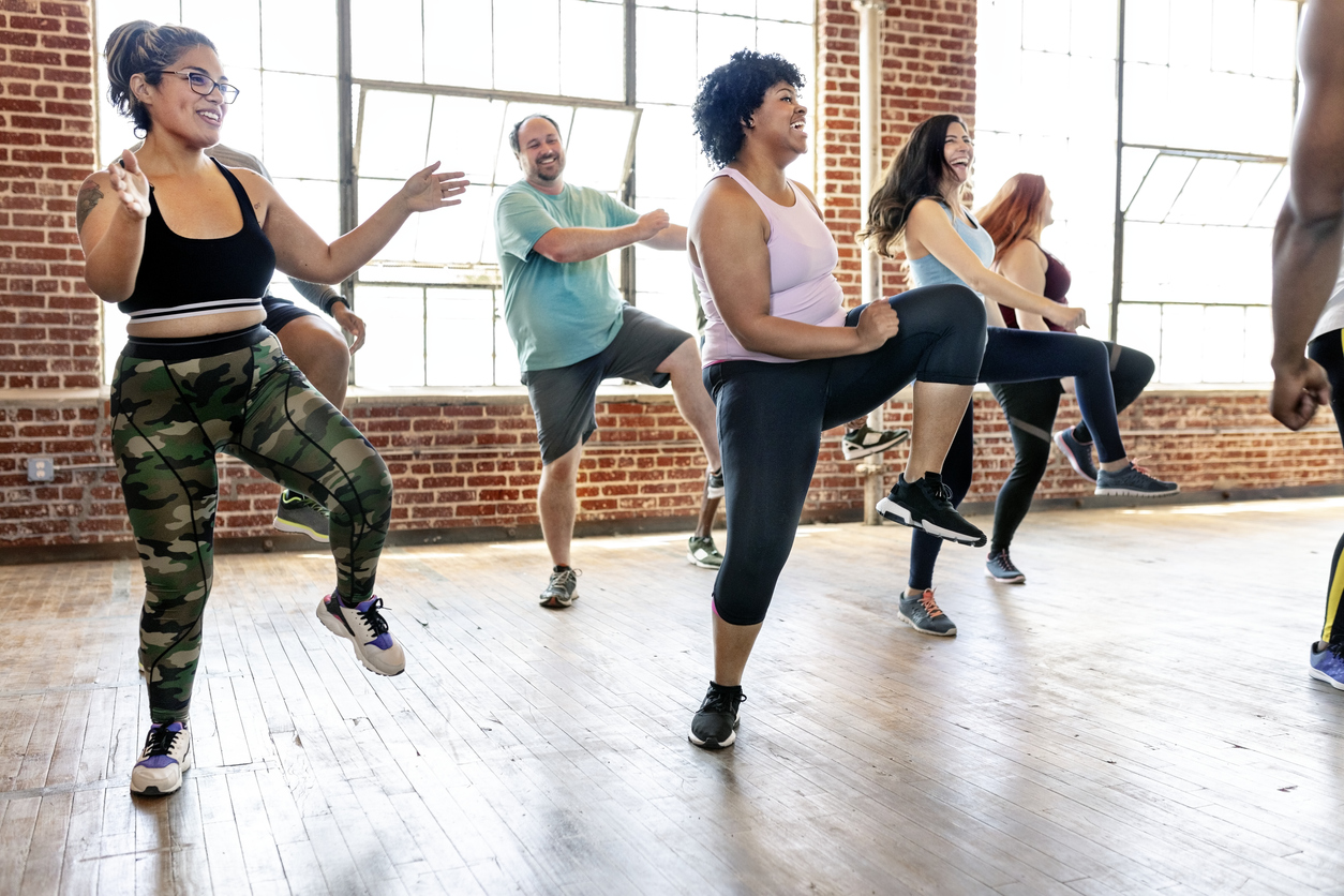 Diverse people in an active dance class